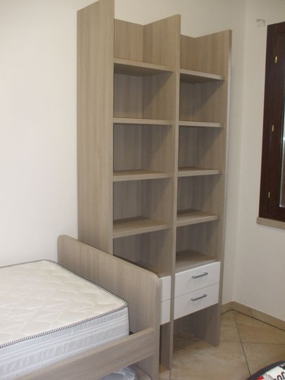 Cameretta con letto estraibile.